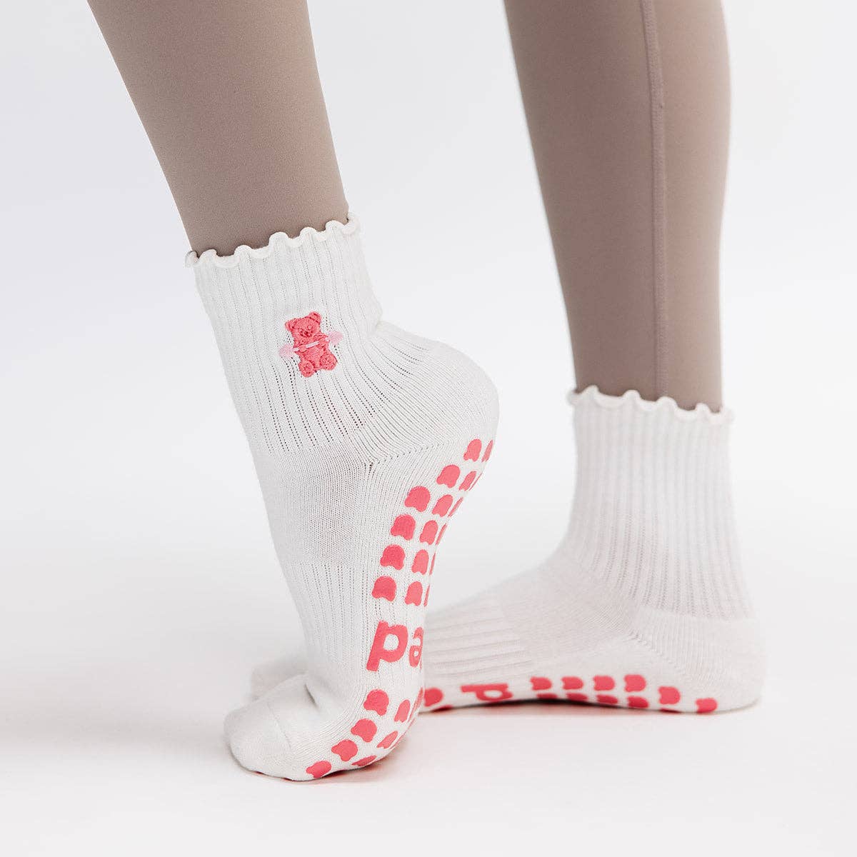 Pink Gummy Bear on Ruffled Cream Pilates Grip Sock
