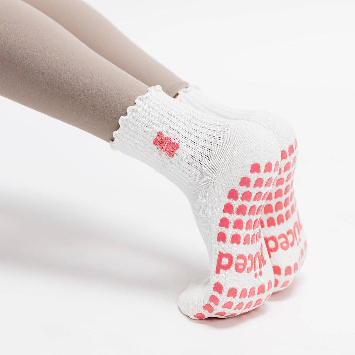 Pink Gummy Bear on Ruffled Cream Pilates Grip Sock