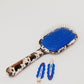 KAXI COW PRINT SCALP TO ENDS BRUSH