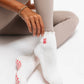 Pink Gummy Bear on Ruffled Cream Pilates Grip Sock