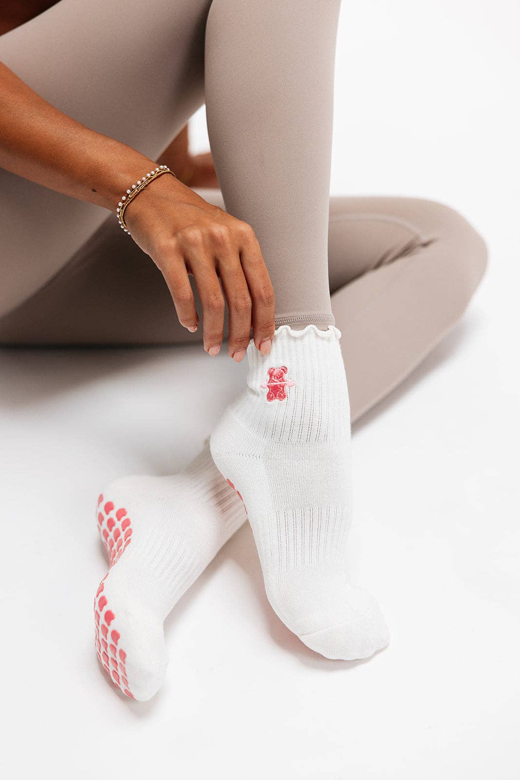 Pink Gummy Bear on Ruffled Cream Pilates Grip Sock